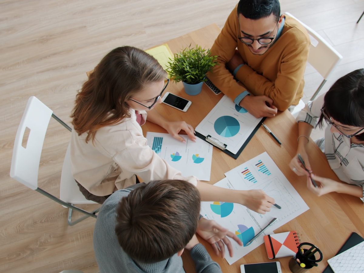 A diverse team collaborating around a table